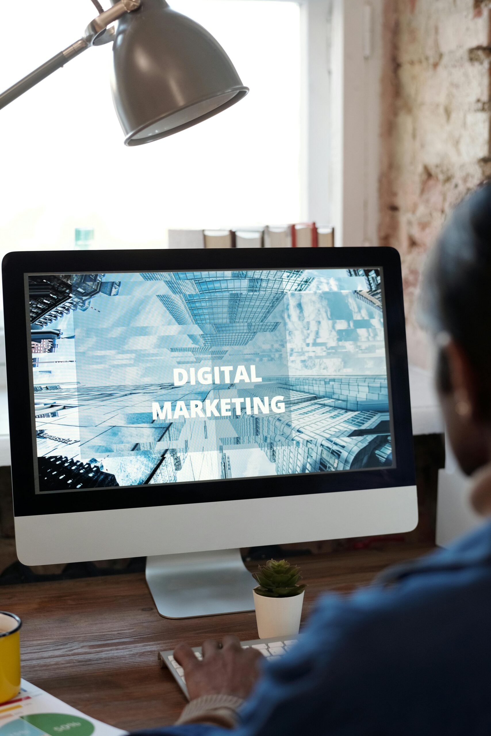 a man who is the best digital marketing strategist in calicut working on a project